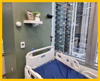  Sensor on wall near bed.  Data cable is dropped vertically to reach gateway near floor.   