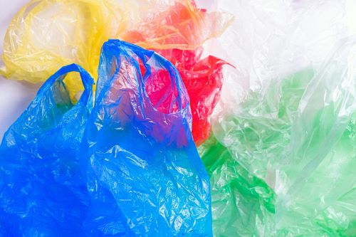 A group of plastic bags in different colors