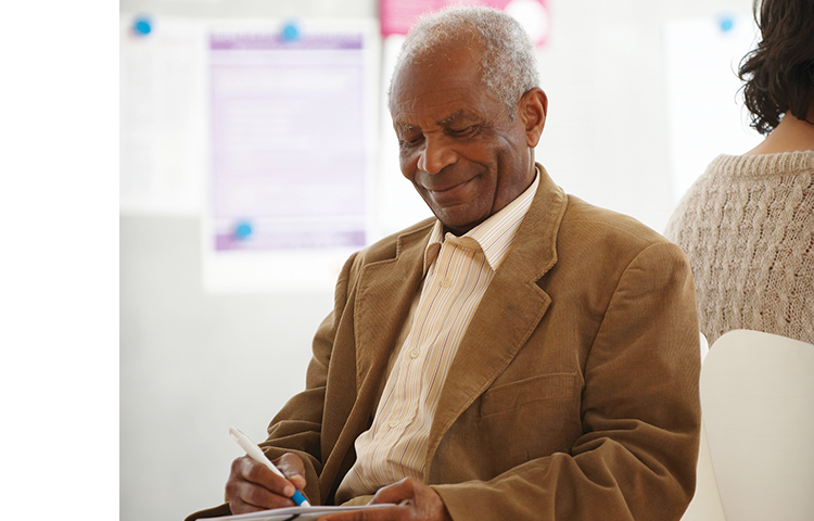 Person writing down baseline information.