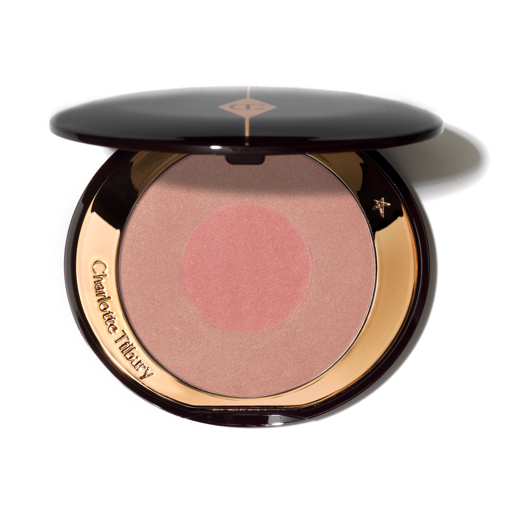 A charlotte tilbury blush with a clip fasten which clicks shut