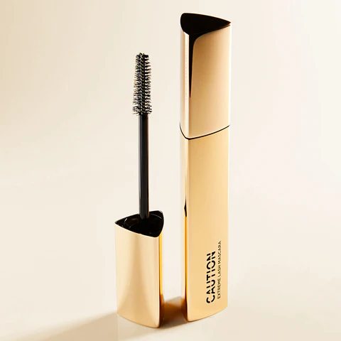 An hourglass mascara - a triangular prism shaped bottle, like a Toblerone