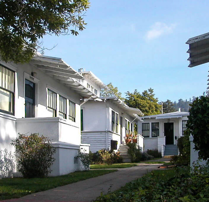 A row of white cottages.