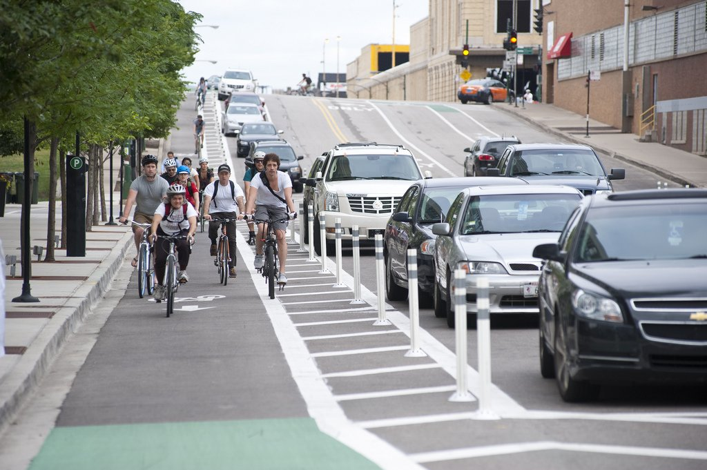  Protected bike lanes – bike lanes separated from the street with protective barriers 